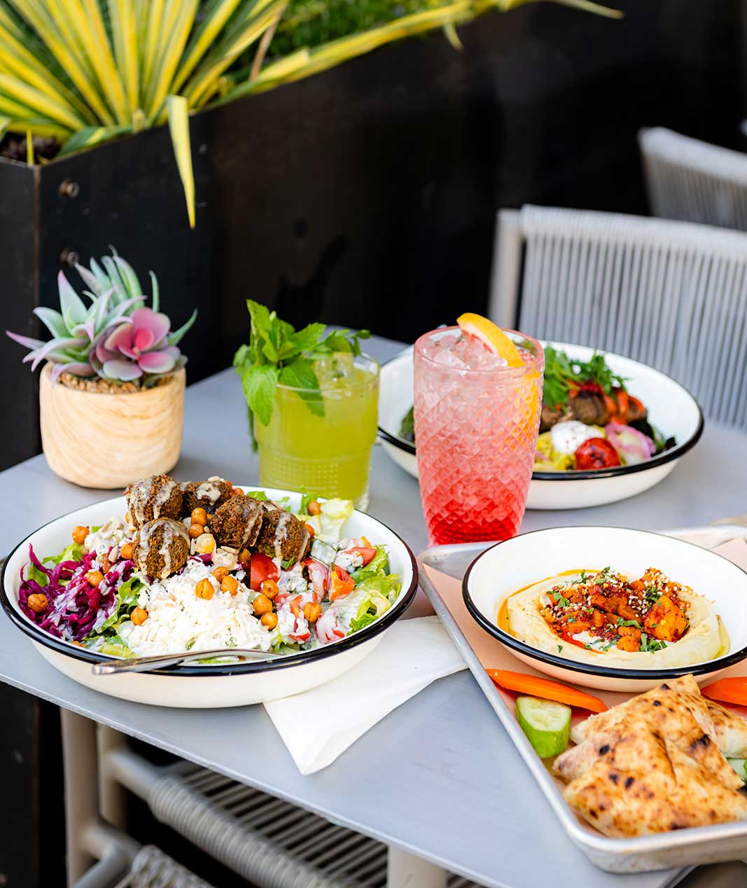 food and drinks on table outside
